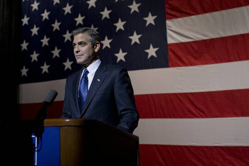 George Clooney in front of an American flag