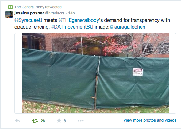 Syracuse builds a fence to hide students' protest. Photo courtesy @THEgeneralbody.