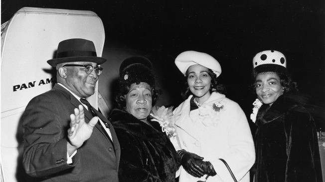 Coretta Scott King, second from right, wife of civil rights leader Dr. Martin Luther King, Jr., prepares to board a Pan Am Clipper, Dec. 5, 1964, at Kennedy Airport in New York, en route to London to meet Dr. King, who was to receive a Nobel Peace Prize on Dec. 10. With Mrs. King are Dr. King's parents, Martin Luther King, Sr. and Alberta Williams King, and at right is Christine Farris, Dr. King's sister. (AP Photo)