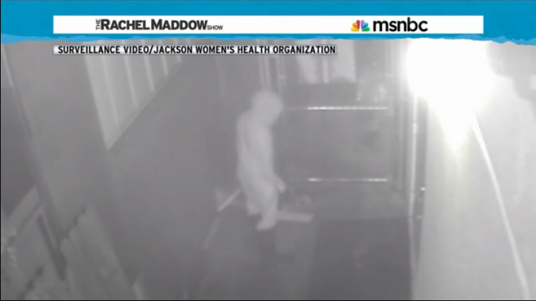 security camera footage of masked intruder
