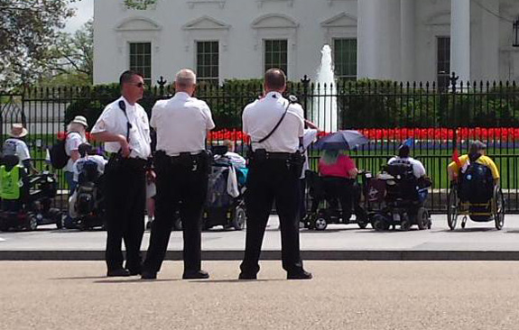 disability rights activists and police outside White House