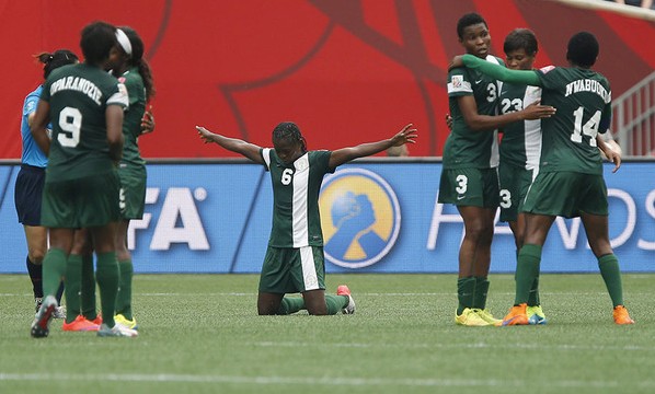 Nigerian soccer players celebrating