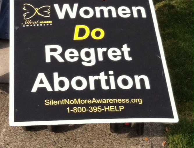 women do regret abortion sign