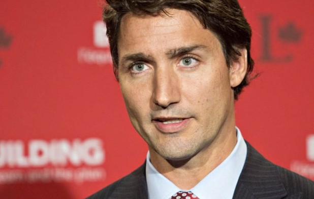 Liberal Leader Justin Trudeau speaks to media during a break at the federal Liberal summer caucus meeting in Edmonton on Tuesday, Aug. 19, 2014. THE CANADIAN PRESS/Jason Franson