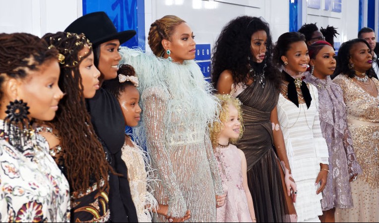 Beyonce stands with the mothers of Trayvon Martin, Oscar Grant, Eric Garner, and Mike Brown on the VMAs red carpet.