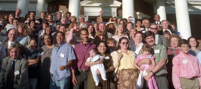 Descendants of Thomas Jefferson and descendants of his slave Sally Hemings pose for a group shot at his plantation Saturday, May 15, 1999, for the first time in 170 years during the Monticello Association's Annual meeting Saturday, May 15, 1999, in Charlottesville, Va. (AP Photo/Leslie Close)