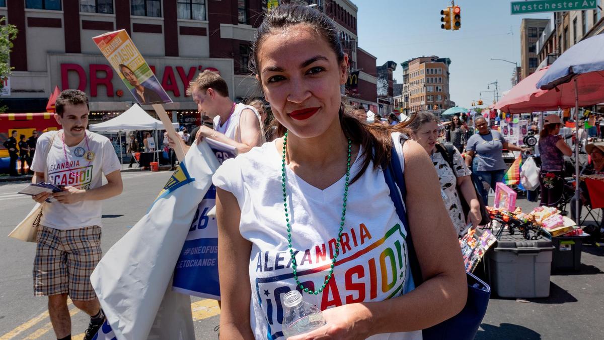 Alexandria-Ocasio-Cortez-marches-during-the-Bronx-s-pride-parade-in-the-Bronx-borough-of-New-York-City